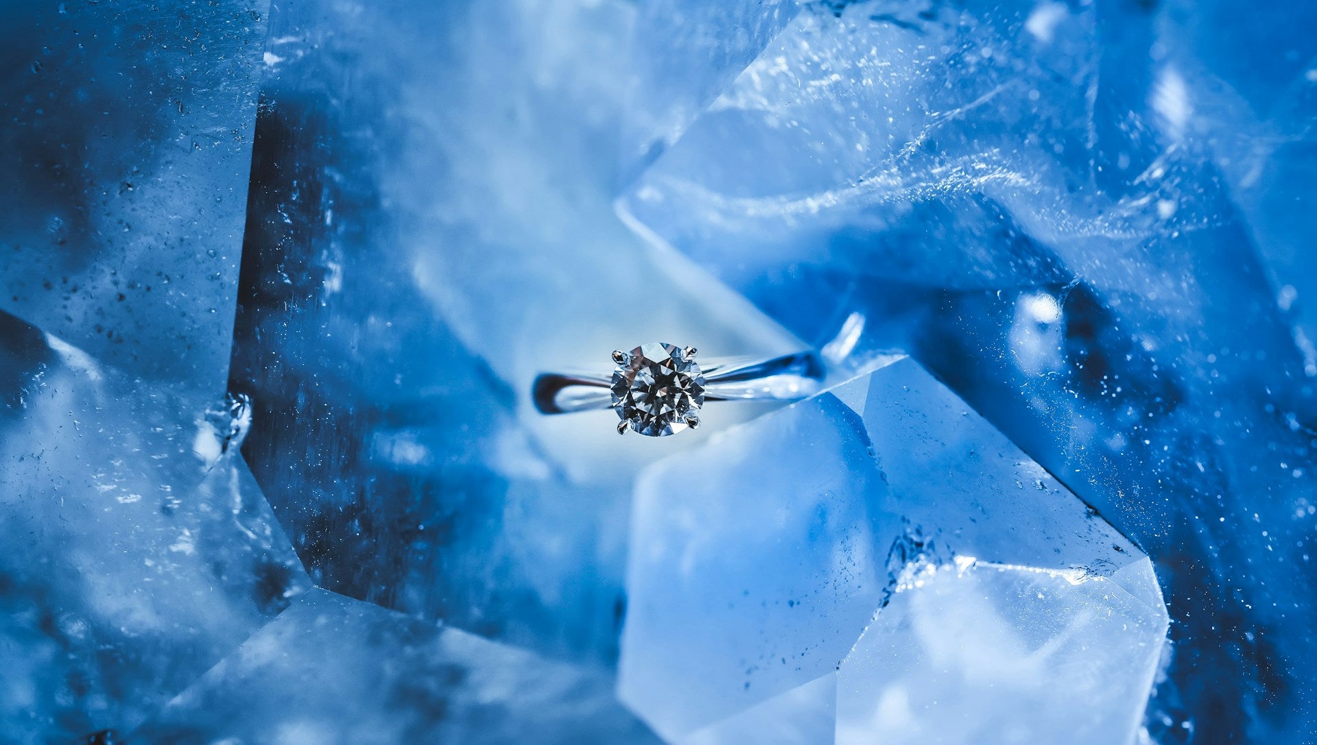 Photo by wu yi on Unsplash https://unsplash.com/photos/silver-colored-ring-with-clear-gemstone-inside-ice-1eLUs_frRpU?utm_content=creditShareLink&utm_medium=referral&utm_source=unsplash